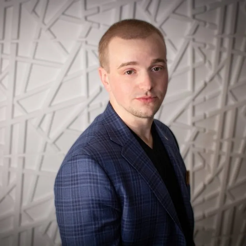 Austin Robichaud, Real Estate Specialist at Fortified Realty Group, dual-licensed in Massachusetts and Rhode Island