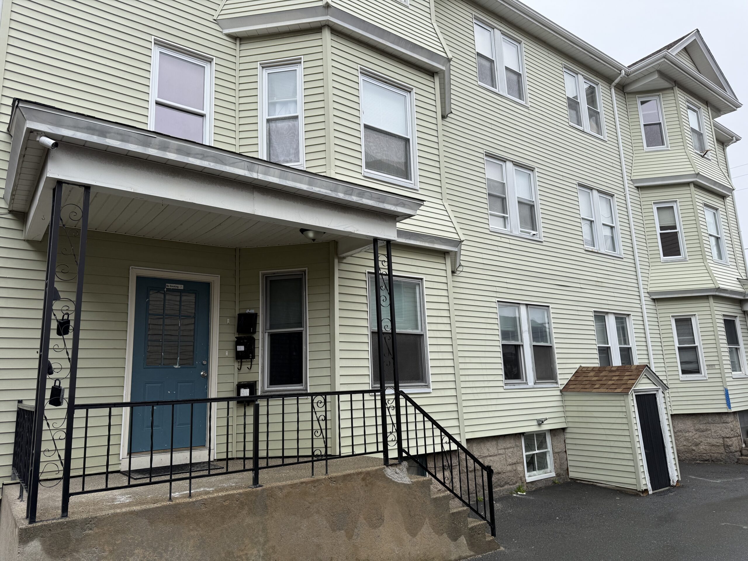 Exterior front porch of 139 Oliver Street, Saint Anne's area, Fall River MA