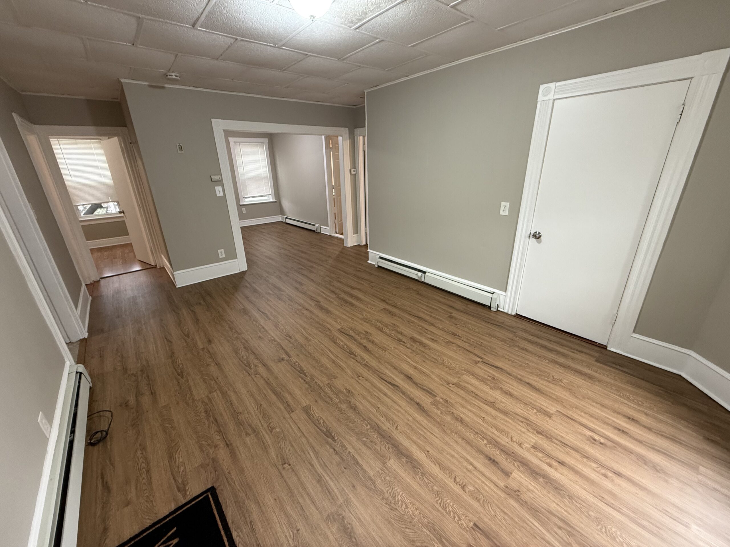Living room wide open layout with hardwood floors