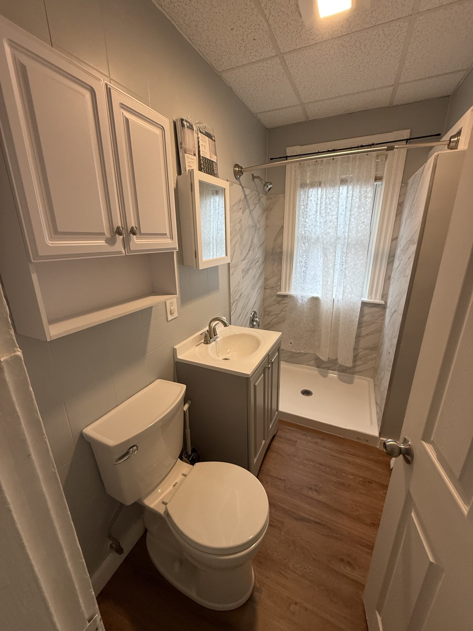 Bathroom with walk-in shower and new vanity