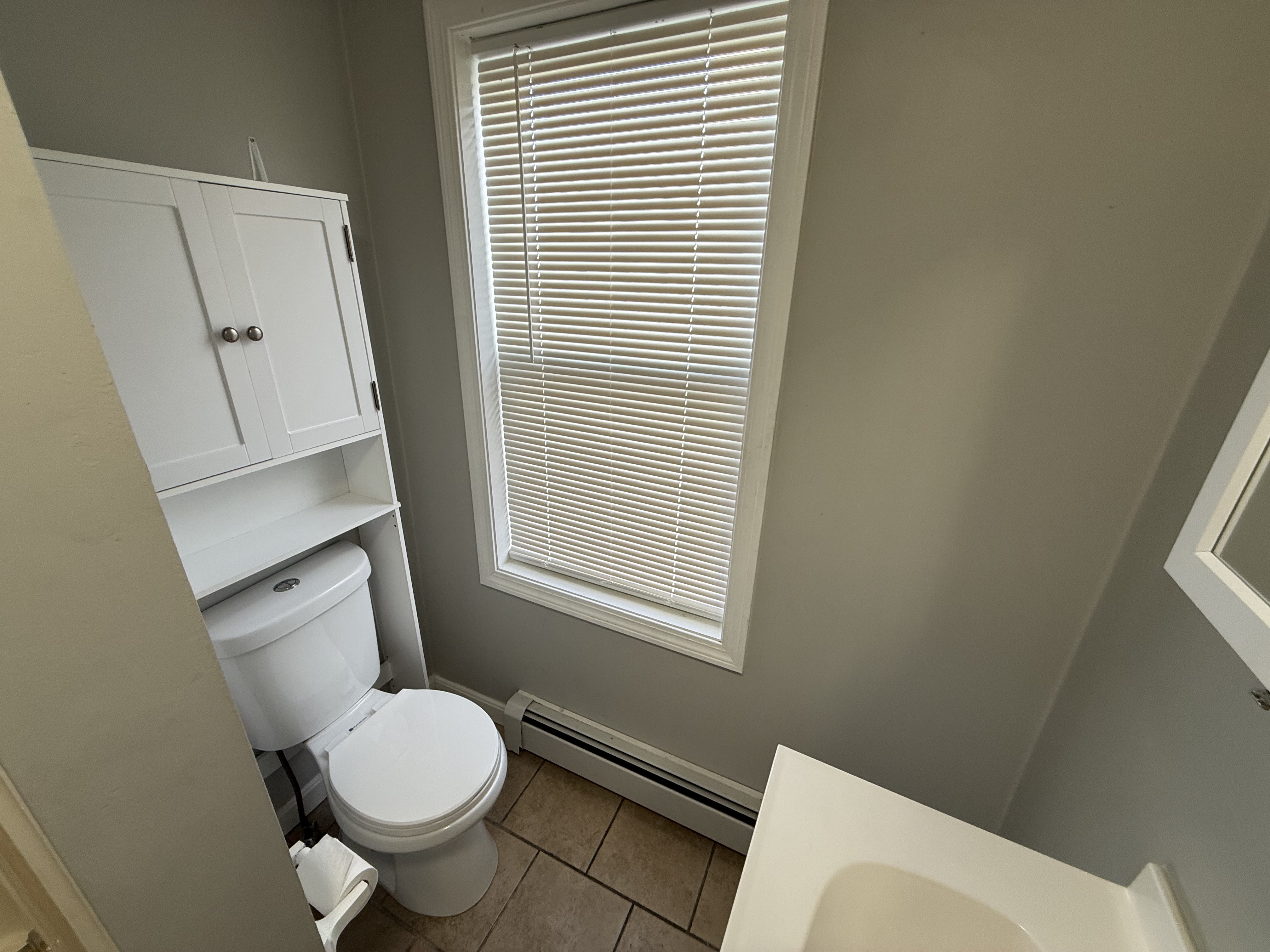 Bathroom toilet and vanity area at 41 Donnelly St Apt 2 Fall River