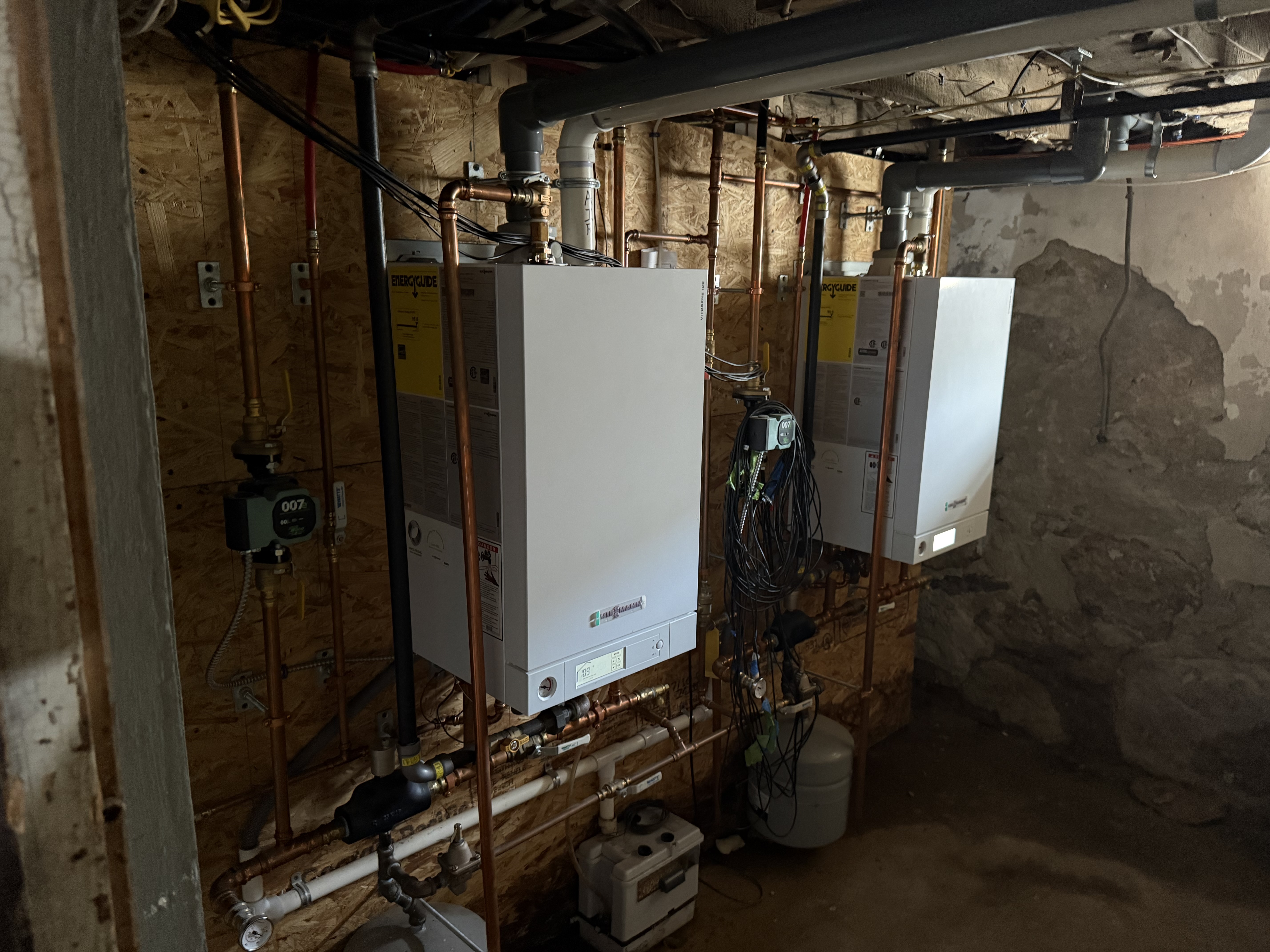 Energy-efficient tankless gas boilers and copper piping in basement at 41 Donnelly St Fall River