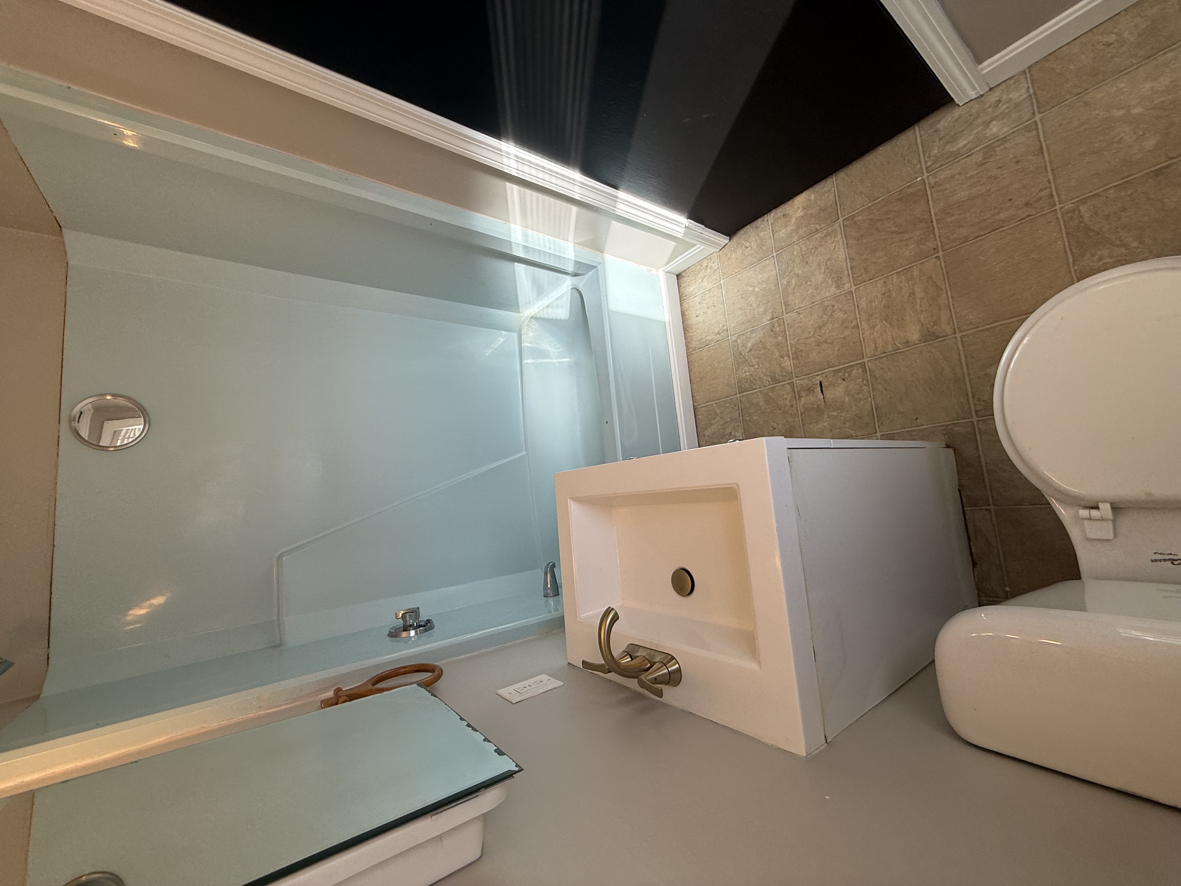 Bathroom with tub and shower combination